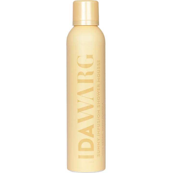 IDA WARG Sunny Infusion Shower Mousse 200 ml vegansk shower mousse i en høj lysegul sprayflaske med matchende låg