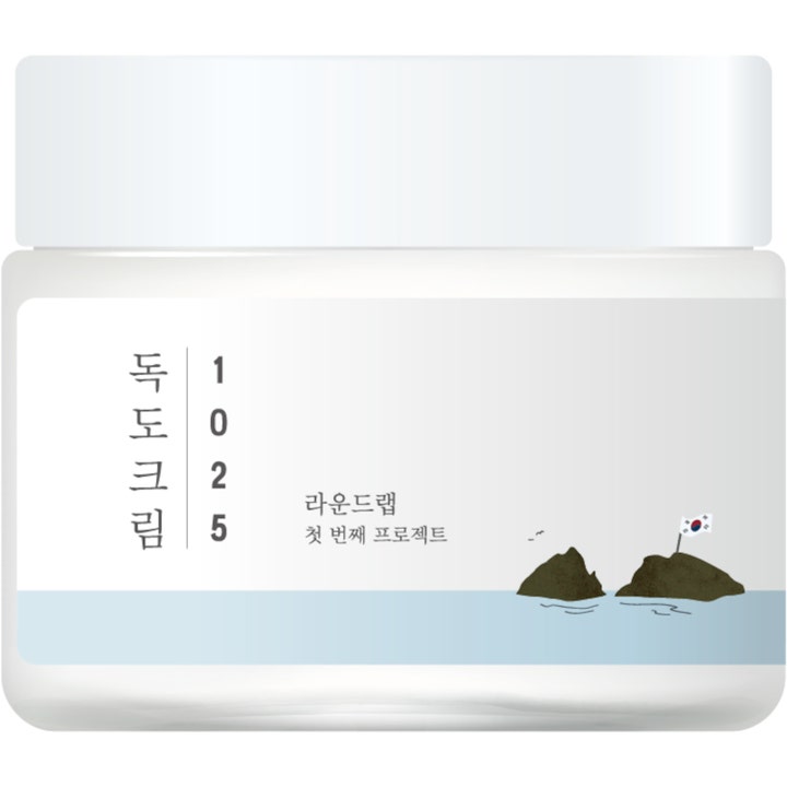 Round Lab 1025 Dokdo Cream 80ml fugtgivende ansigtscreme i en hvid krukke med illustration af klipper og hav.