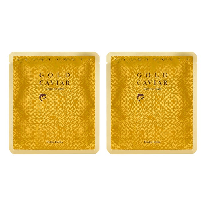 Holika Holika Prime Youth Gold Caviar Gold Foil Mask arkmaske giver glød i to guldskinnende pakker med fint cirkelmønster
