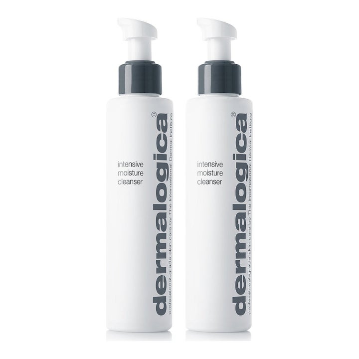 Dermalogica Intensive Moisture Cleanser fugtgivende ansigtsrens til tør hud i to hvide flasker med grå pumpe