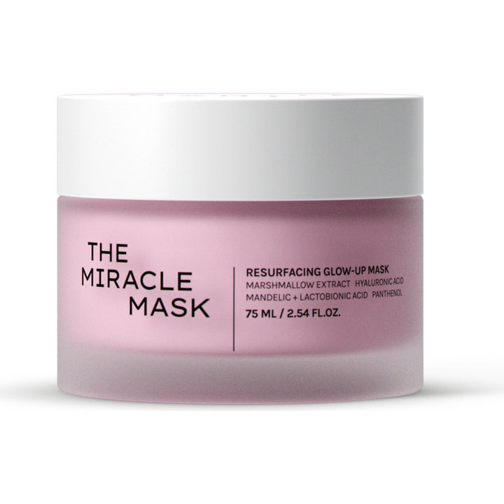 The Miracle Mask 75 ml eksfolierende ansigtsmaske i en lyserød krukke af frostet glas med hvidt låg