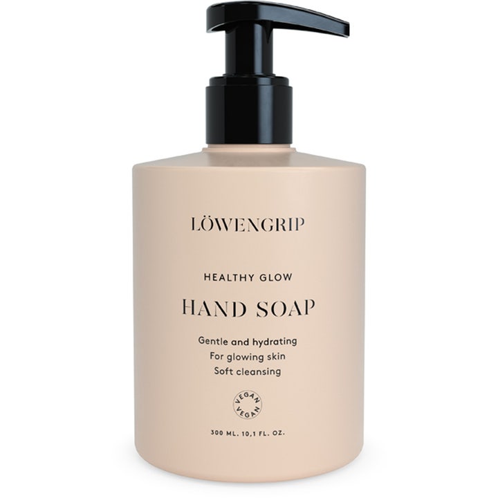 Löwengrip Healthy Glow Hand Soap 300 ml fugtgivende håndsæbe i beige flaske med sort pumpe der skaber glød