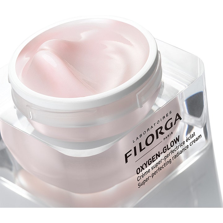 Filorga Oxygen-Glow Cream 50 ml glødgivende ansigtscreme med lyserød cremet tekstur i en gennemsigtig krukke
