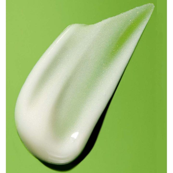 Murad Resurgence Retinol Youth Renewal Serum 30 ml med glitrende hvid creme-tekstur på grøn baggrund