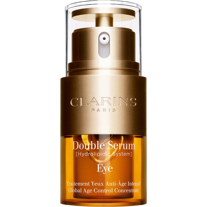 Clarins Double Serum Eye opstrammende øjencreme i en elegant guld og ravfarvet pumpeflaske med to kamre