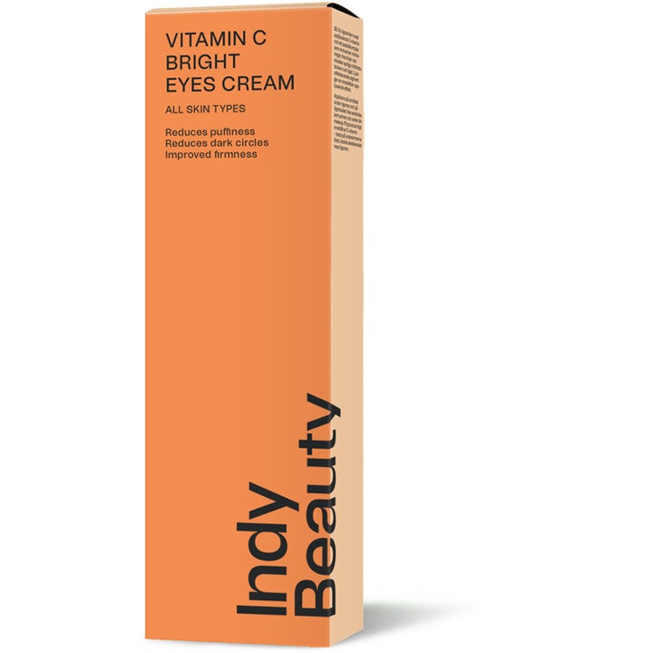 Indy Beauty Vitamin C Bright Eyes Cream 15 ml opstrammende øjencreme i en ferskenfarvet papæske.