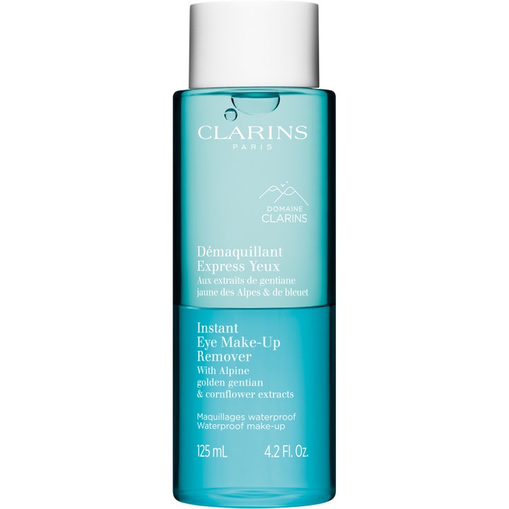 Clarins Instant Eye Make-Up Remover 125 ml fjerner vandfast makeup skånsomt i en blå gennemsigtig flaske med hvidt låg