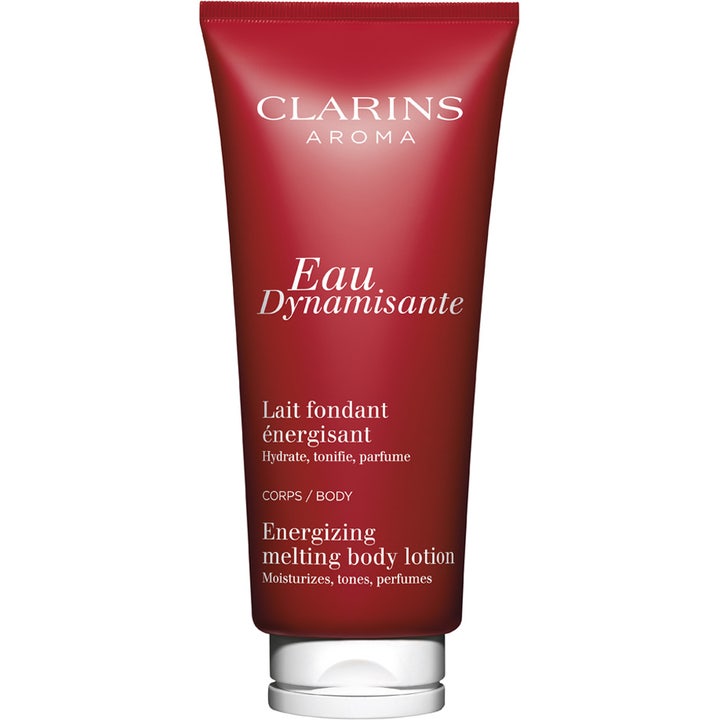 Clarins Eau Dynamisante Energizing Melting Body Lotion fugtgivende bodylotion i rød tube med hvidt låg