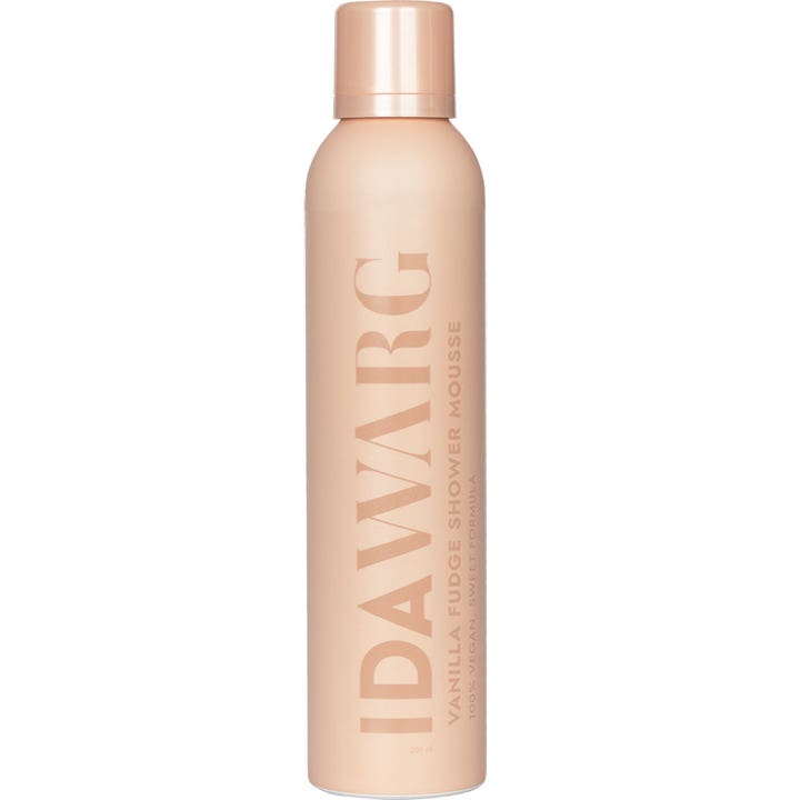 Ida Warg Vanilla Fudge Shower Mousse 200 ml fugtgivende bodyshampoo i ferskenfarvet sprayflaske med vertikal tekst