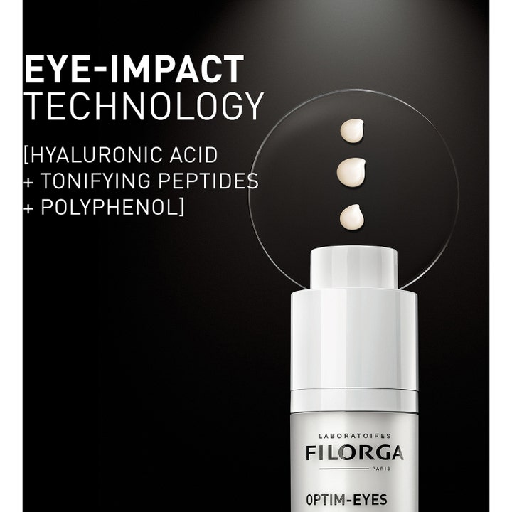 Filorga Optim-Eyes 15 ml øjencreme med Eye-Impact Technology og hvid creme på glasplade mod mørke rande.