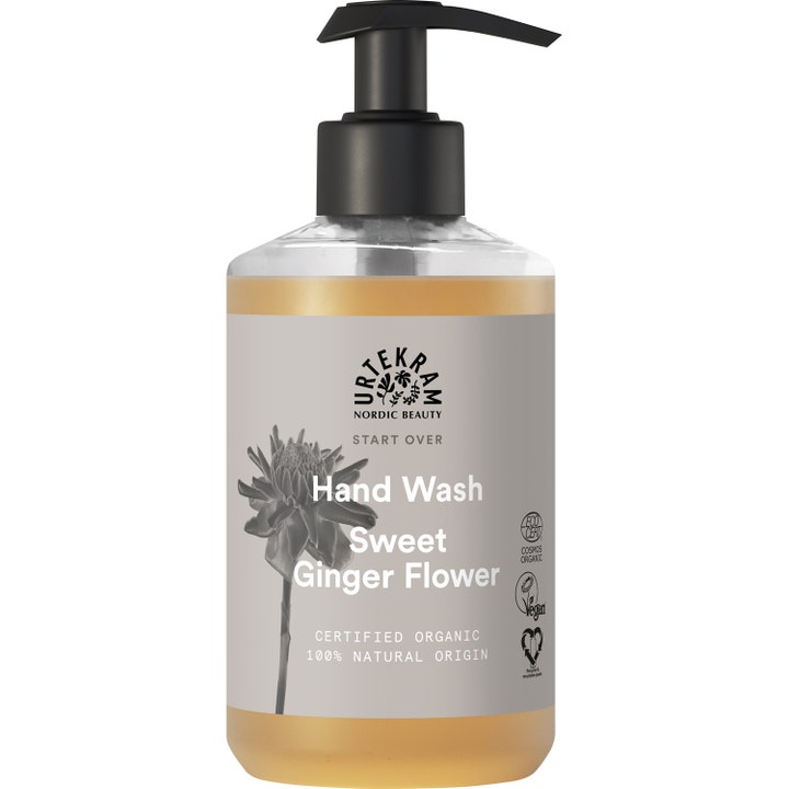 Urtekram Sweet Ginger Flower Hand Wash økologisk håndsæbe i gennemsigtig flaske med gylden væske og sort pumpe