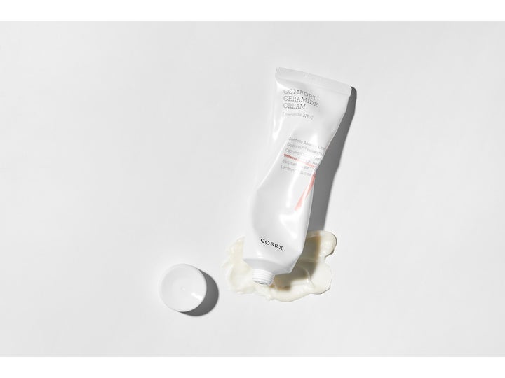 COSRX Balancium Comfort Ceramide Cream 80 ml beroligende ansigtscreme i hvid tube med fyldig hvid tekstur.