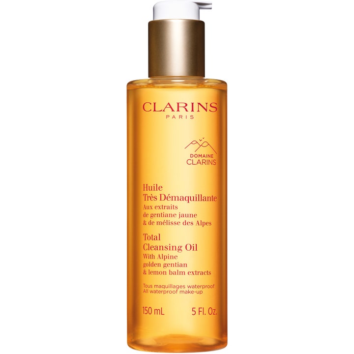 Clarins Total Cleansing Oil 150 ml rensende olie til vandfast makeup i orange plastflaske med hvid pumpe.