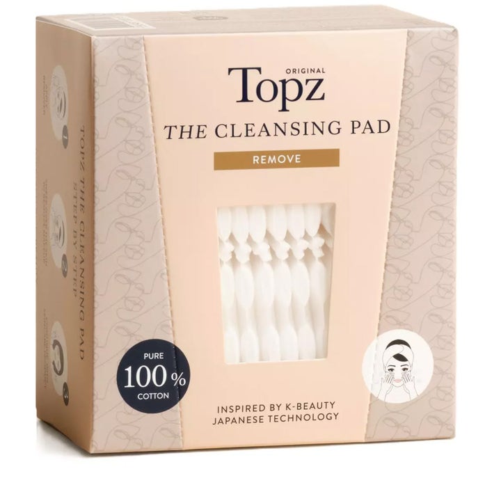 Topz The Cleansing Pad bomuldspads fjerner makeup i beige æske med vindue der viser de hvide 100% bomuldspads.
