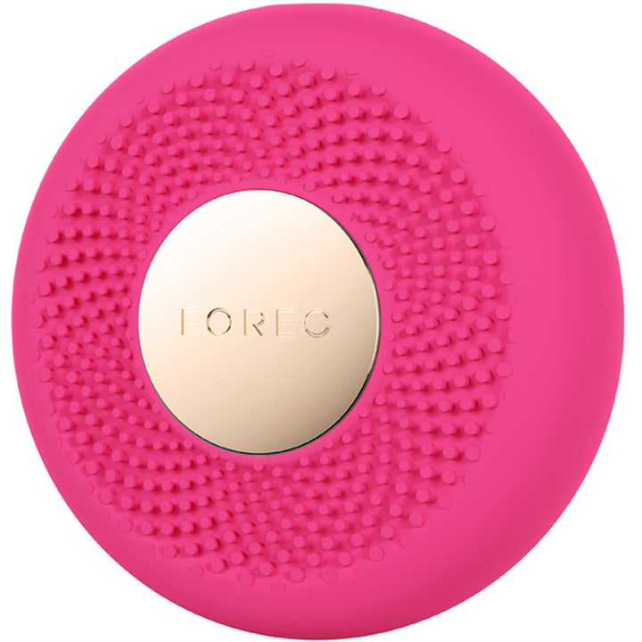 FOREO UFO™ 3 mini Fuchsia 1 stk fugtgivende beauty tech i rund fuchsia silikone med tekstur og guldplade