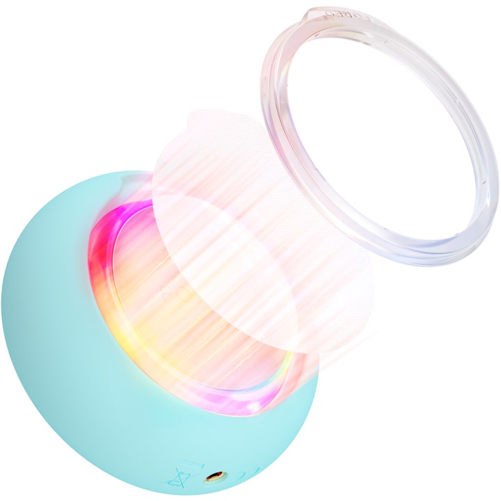 FOREO UFO 3 Mint 1 stk fugtgivende beauty tech vist med mintgrøn enhed, varmt LED-lys, ansigtsmaske og gennemsigtig ring