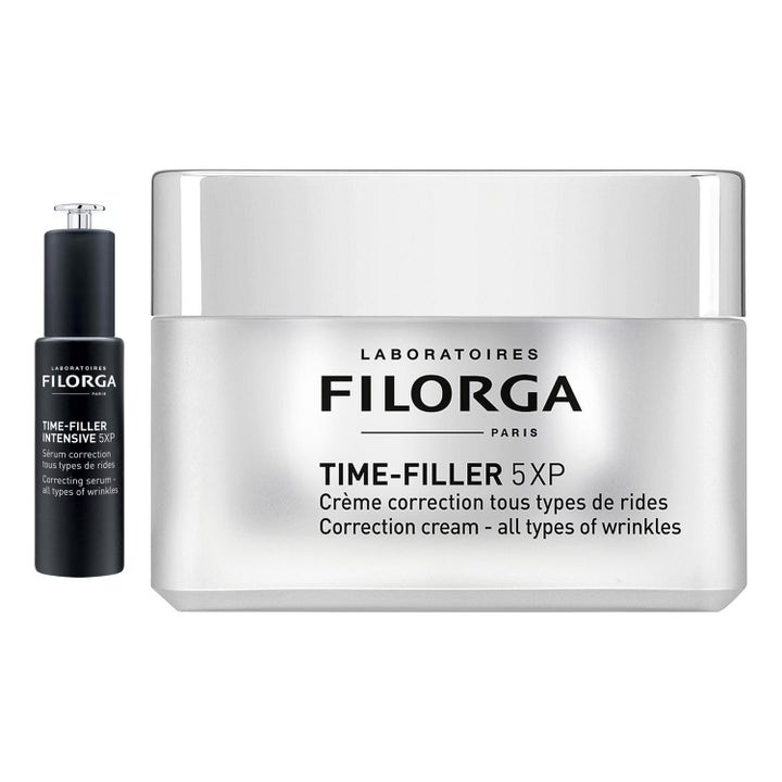 Filorga Time-Filler rynkekorrigerende creme og serum i hvid krukke og frostet glasflaske med dryppende pipette.