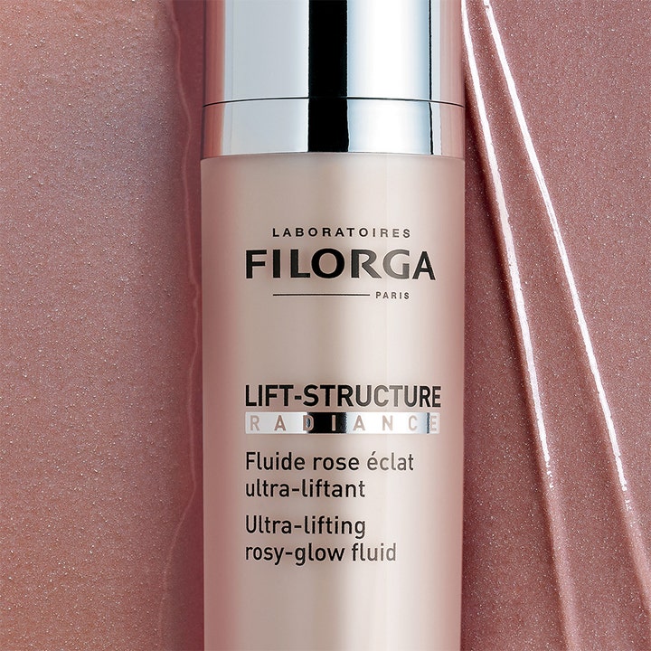 Filorga Lift-Structure Radiance 50 ml opstrammende dagcreme i lyserød pumpeflaske mod glitrende tekstur