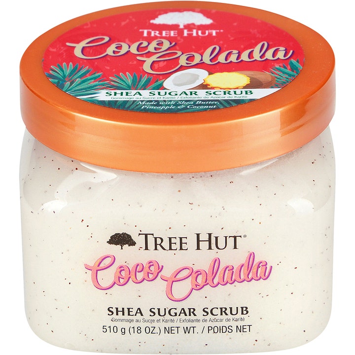 Tree Hut Shea Sugar Scrub Coco Colada 510 g eksfolierende body scrub i krukke med rosaguld låg og hvid kornede tekstur