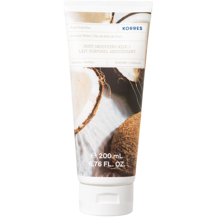 Korres Coconut Water Body Smoothing Milk 200 ml blødgørende bodylotion i hvid tube med friske kokosnødder.