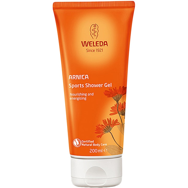 Weleda Arnica Sports Shower Gel 200 ml nærende kropsvask i en klar orange tube med illustration af blomster.