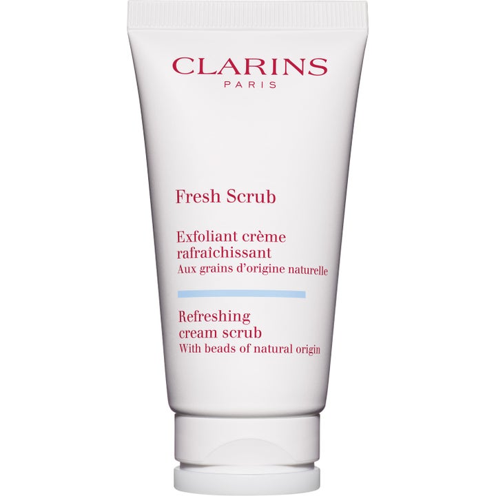 Clarins Fresh Scrub opfriskende ansigtsscrub i hvid tube med rød tekst der eksfolierer og giver huden glød