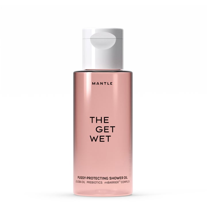 Mantle The Get Wet plejende shower oil i gennemsigtig flaske med lyserød formel og hvidt vippelåg