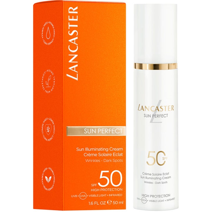 Lancaster Sun Perfect Illuminating Cream SPF50 50 ml solcreme i hvid pumpeflaske og orange æske mod mørke pletter