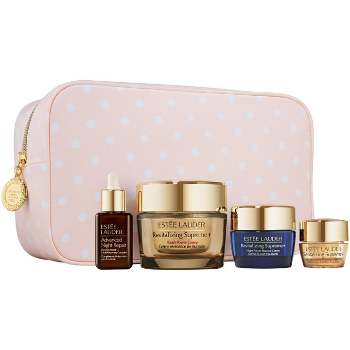Estée Lauder Revitalizing Supreme+ 4-delt hudplejesæt mod rynker i lyserød prikket taske med guld krukker