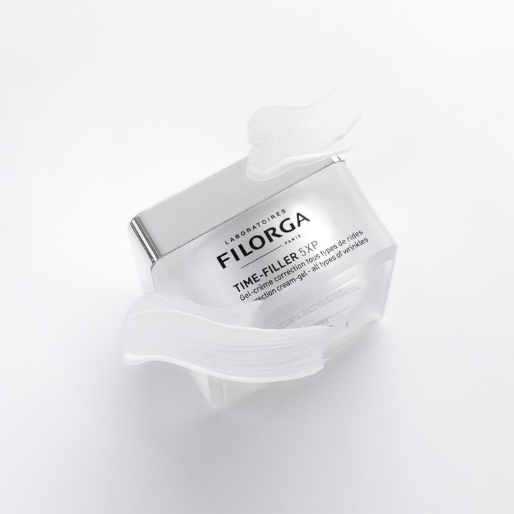 Filorga Time-Filler 5 XP Cream Gel 50 ml anti-age ansigtscreme i frostet krukke med hvide teksturstrøg.