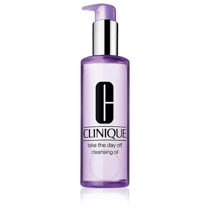 Clinique Take The Day Off Cleansing Oil 200ml makeupfjerner i lilla gennemsigtig plastflaske med sølvfarvet pumpe