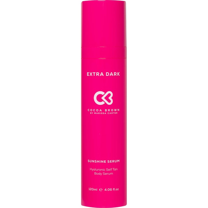 Cocoa Brown Sunshine Serum Extra Dark 120 ml selvbruner til krop i en klar pink flaske med pumpe.