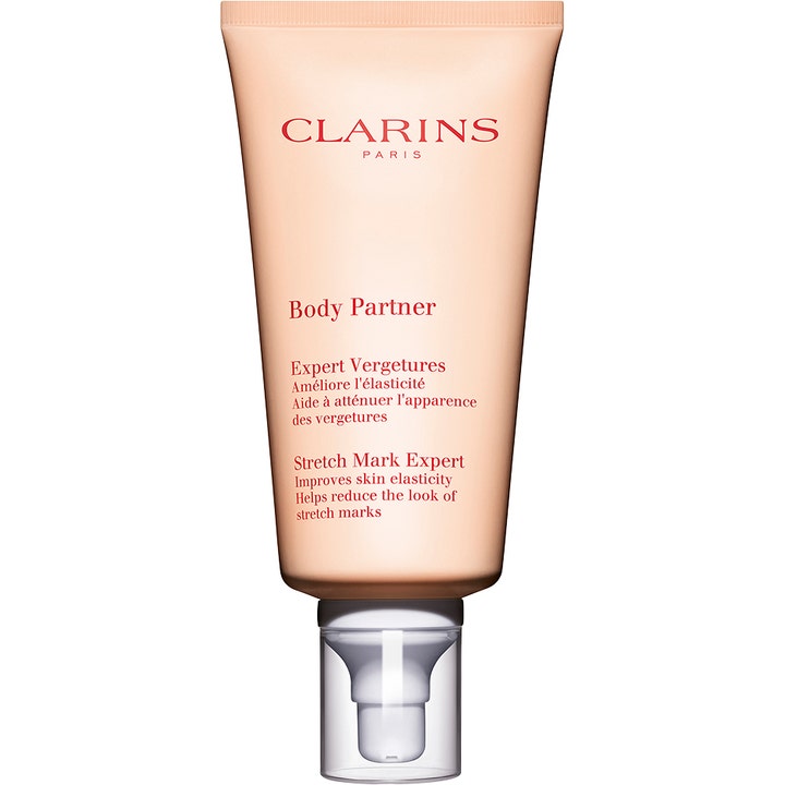 Clarins Body Partner Stretch Mark Expert kropscreme mod strækmærker i ferskenfarvet tube med gennemsigtig pumpe