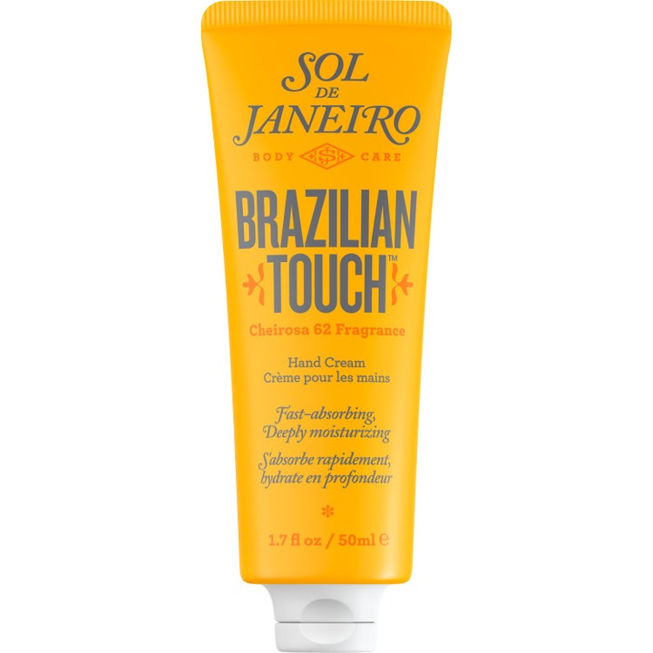 Sol de Janeiro Brazilian Touch 50ml fugtgivende håndcreme i en klar gul tube med hvidt låg og blå tekst.