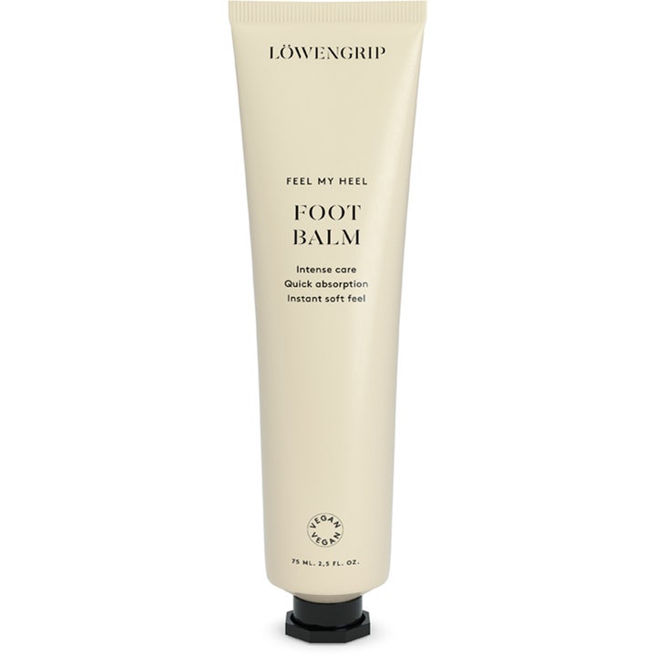 Löwengrip Feel My Heel Foot Balm 75 ml blødgørende fodcreme giver intens pleje i beige tube med sort låg