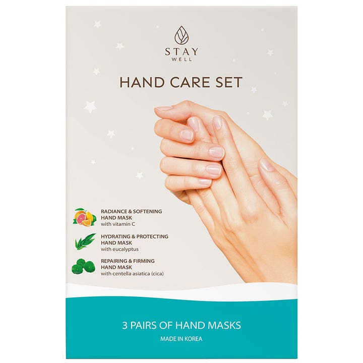 Stay Well Hand Care Set 3 par plejende håndmasker der giver fugt og glød i hvid emballage med billede af hænder.