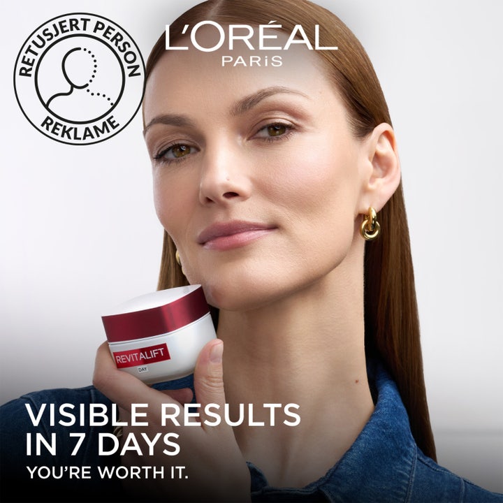 L'Oréal Paris Revitalift 50 ml opstrammende dagcreme med cremet hvid tekstur i en hvid krukke med rødt låg