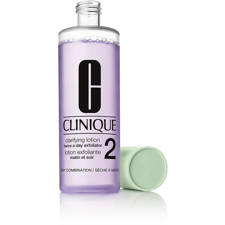 Clinique Clarifying Lotion 2 200 ml eksfolierende toner med lilla væske og et lysegrønt låg ved siden af