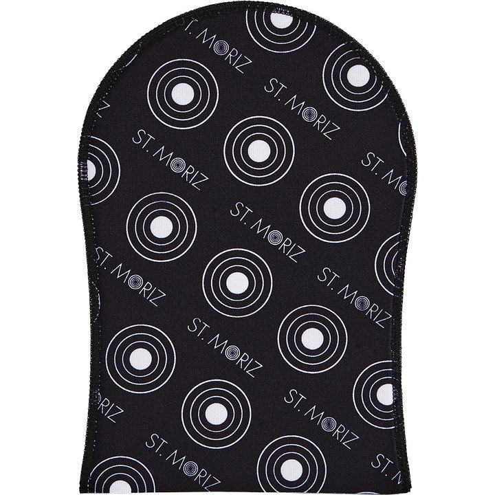 St. Moriz Self Tanning Mitt 1 stk applikationshandske giver jævn selvbruner i sort stof med hvide cirkler.