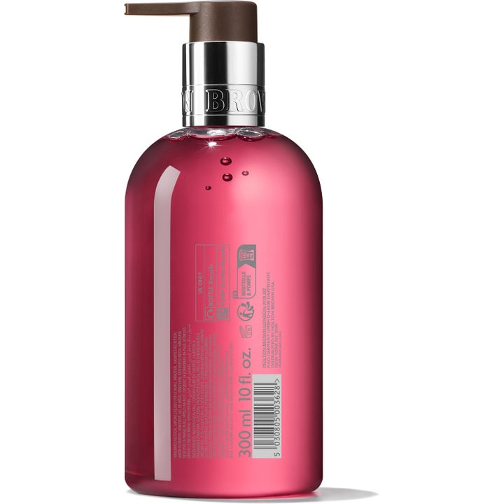 Molton Brown Fiery Pink Pepper 300 ml håndsæbe i gennemsigtig flaske med pink gelé og synlig ingrediensliste bagpå