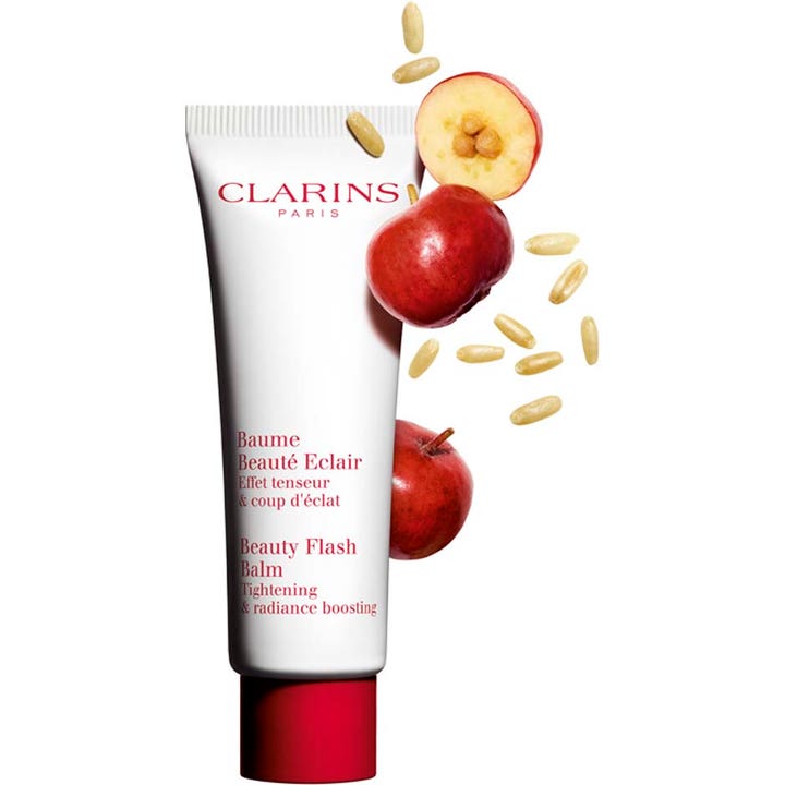 Clarins Beauty Flash Balm 50 ml opstrammende ansigtscreme i hvid tube med røde bær og kerner
