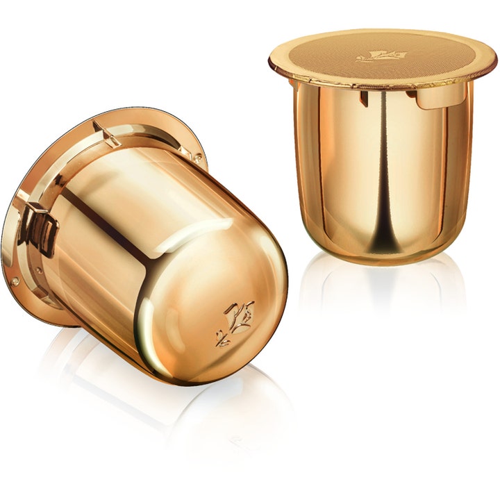 Lancôme Absolue Soft Cream 60 ml regenererende ansigtscreme vist som to skinnende guldfarvede refill-kapsler.