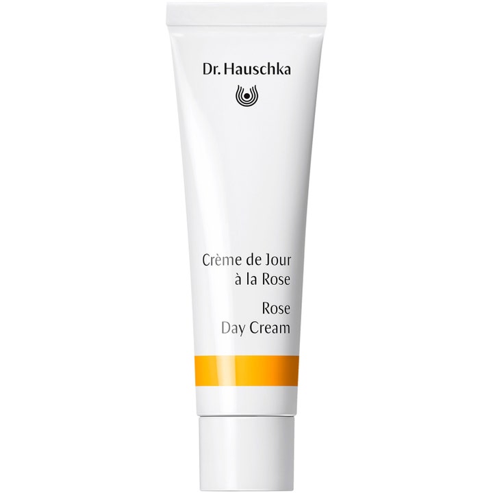 Dr. Hauschka Rose Day Cream nærende ansigtscreme i hvid tube med gul stribe og hvidt låg.