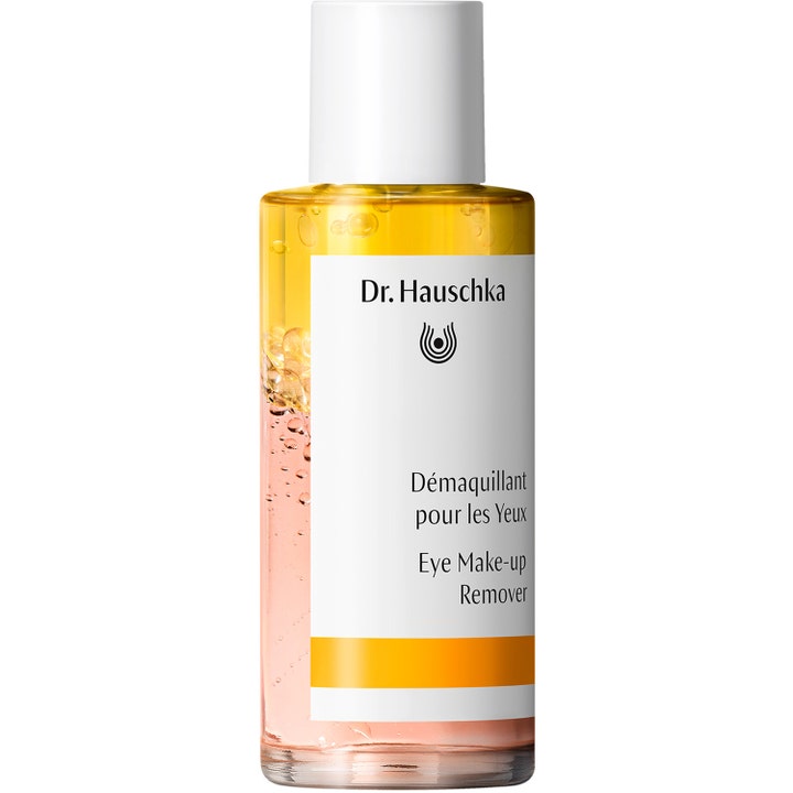 Dr. Hauschka Eye Make-up Remover 75 ml skånsom makeupfjerner med tofaset gul og rosa væske i glasflaske med hvidt låg.