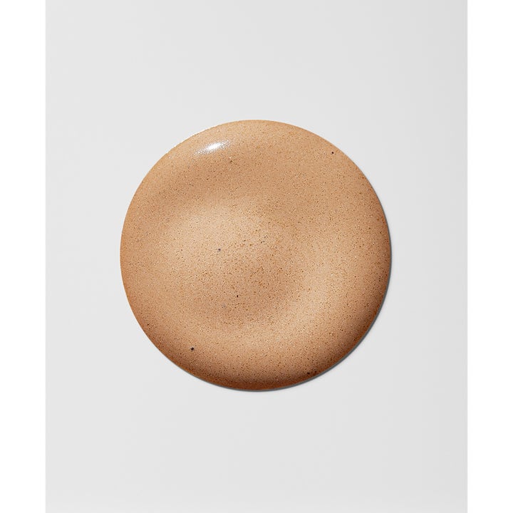 Heliocare Water Gel Color SPF 50+ Beige 50 ml solcreme til ansigtet viser en rund klat af den lette, farvede tekstur.