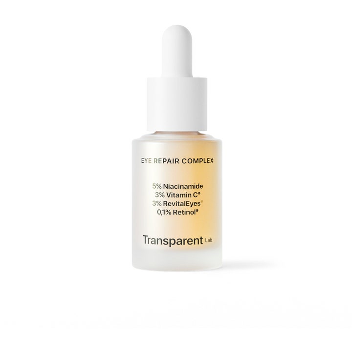Transparent Lab Eye Repair Complex 15 ml øjenserum mod mørke rande i matteret glasflaske med hvid pipette og gult indhold