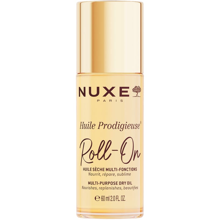Nuxe Huile Prodigieuse Roll-On 60 ml nærende tørolie i en slank gennemsigtig flaske med en elegant guldfarvet hætte