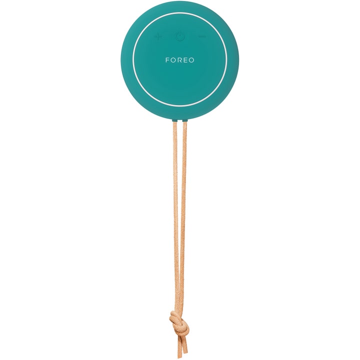 FOREO LUNA 4 body Evergreen 1 stk kropsbørste giver glat hud rund mørkegrøn silikoneenhed med beige snor