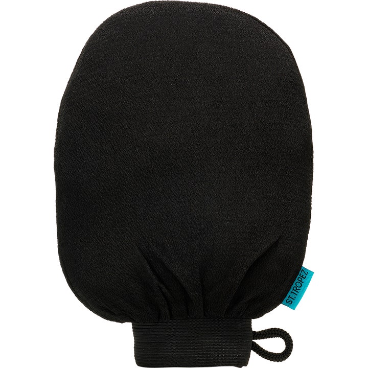 St. Tropez Applicator Mitt 1 stk til jævn selvbruning er en sort blød handske i fløjl med et lille blåt logo-mærke.