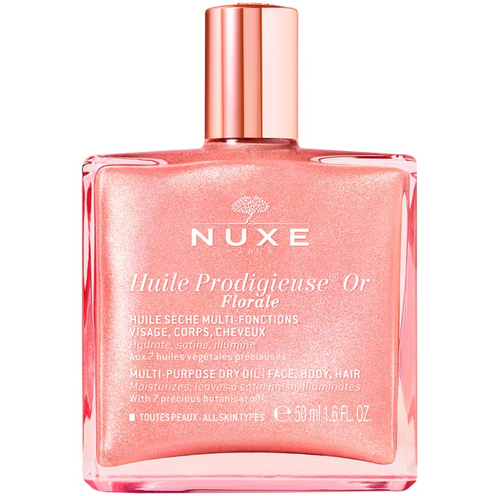 Nuxe Huile Prodigieuse Or Florale 50 ml glødgivende tørolie i klar glasflaske med rosa glitrende olie og metallåg